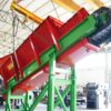 Industrial Apron Conveyor with metal plates manufactured by Ghirarduzzi, suitable for foundries, furnace loading, mill feeding and recycling plants, customizable up to 2000 mm width