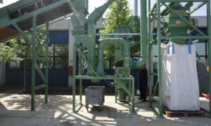 Industrial zig zag air separator by Ghirarduzzi SRL, a machine for material separation in recycling plants, designed for metal recovery, and for separating fine powders and light granules, installed within an industrial structure
