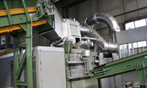 Close-up view of an extraction hood system for a smelting furnace by Ghirarduzzi.